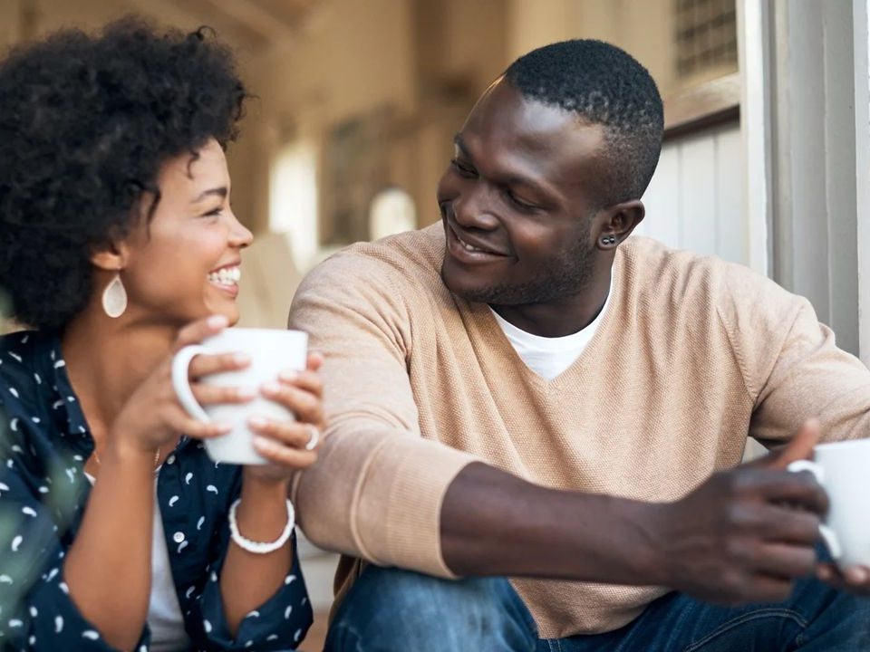 Happy couple drinking coffee